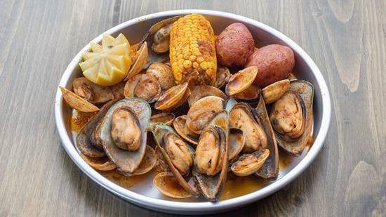 Mussels & Clams · Each pound seafood comes with one corn and two potatoes.