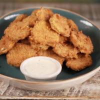 Fried Pickles · Hand-breaded dill pickle chips, served with our ranch dipping sauce
