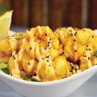 Lava Lava Shrimp · Golden fried shrimp drizzled with our Thai chili sauce. 920 cal.