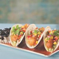 Fish Tacos · Fish Tacos
Crisply fried in LandShark batter wrapped in a grilled flour tortilla and layered...
