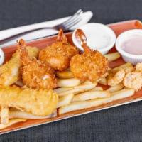 Seafood Combo  · A sampling of our LandShark® fish and chips, coconut shrimp and fried shrimp served with Fre...