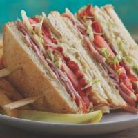 Beach Club · Sliced roasted turkey and ham, swiss cheese, applewood-smoked bacon, lettuce, tomato and Hel...