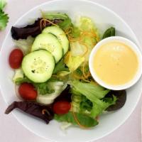 Green Salad · Served with ginger dressing.