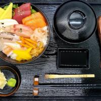 Chirashi Don · 15 pieces of sashimi over sushi rice and Japanese pickle, served with soup or salad, and fre...