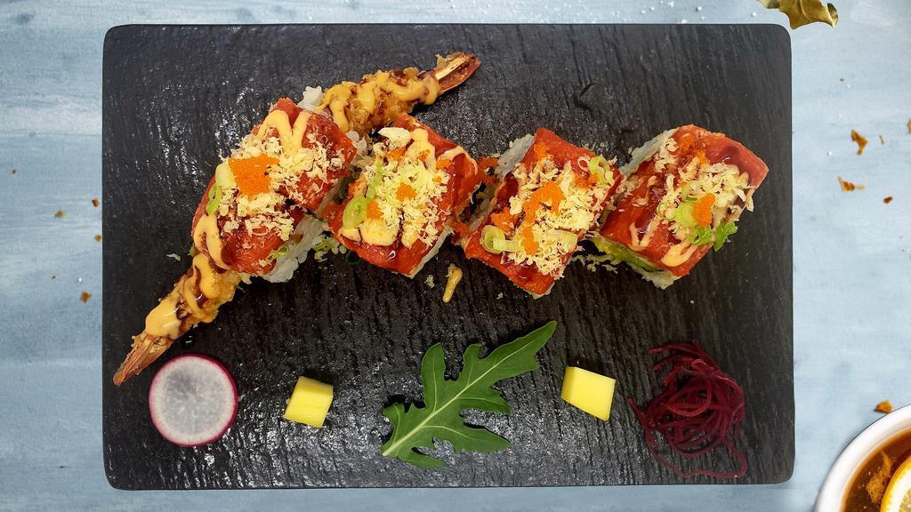 Volcano Roll · In : shrimp tempura, avocado
Out: spicy tuna
Top: eel sauce, spicy mayo, crunchy, scallion, masago