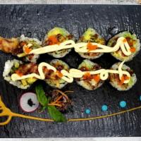 Spider Roll · In: soft shell crab, avocado, cucumber
Top: eel sauce, mayo, masago