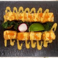 Lucky Roll · In: tuna, avocado
Out: spicy salmon
Top: spicy mayo, masago