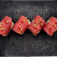 Tuna Flight Roll · In: spicy tuna, avocado
Out: bluefin tuna
Top: red tobiko, kime zest