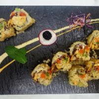 Dynamite Roll · (Deep fried roll) 
In: kani, asparagus, cream cheese
Top: eel sauce, spice mayo, crunchy, sc...