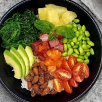 Rainbow Poke Bowl · Salmon, tuna, yellowtail, seaweed salad, edamame, avocado, tomato, pineapple, almond, masago...