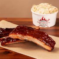 Ribs · St Louis style Ribs rubbed with our special dry rub, smoked for up to 6 hours then brushed w...