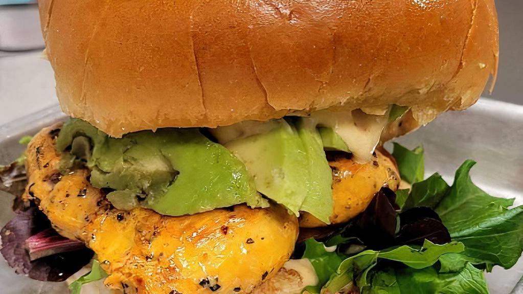 Gloria'S Grilled Chicken Sandwich  · Our seasoned chicken breast grilled and served on a toasted brioche bun with lettuce, tomato, house sauce and avocado