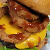 Jb'S Onion Ring Burger · Premium short rib burger topped with American cheese, onion rings, pickle, lettuce, tomato, ...