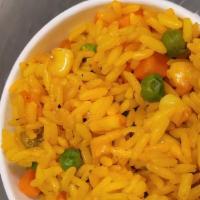 Yellow Seasoned Rice · Yellow seasoned rice with mixed vegetables