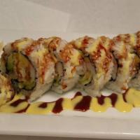 Spider Roll · Soft shell crab, cucumber, avocado e- mayonnaise, top with eel sauce.