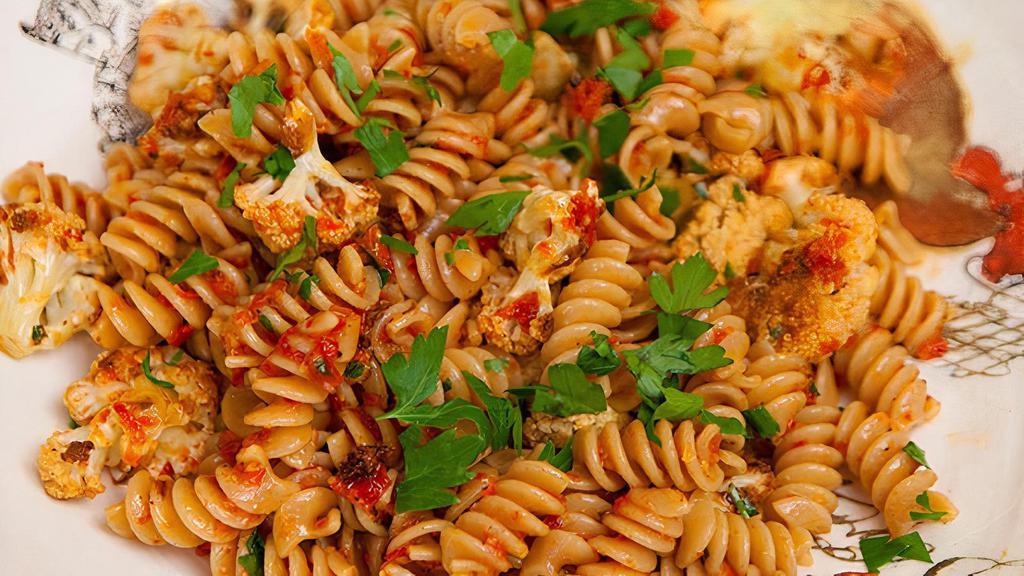 Fusilli With Sun-Dried Tomatoes · Fusilli pasta, sun-dried tomatoes capers, Gorgonzola cheese cream sauce.