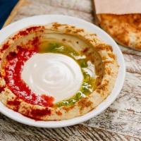 Hummus · Small Hummus with tahini, grated tomato & chili oil.  Served with 1 pita.  . *It's gluten-fr...