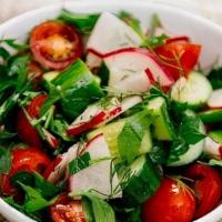 Shirazi (Large) · Salad of tomato, persian cucumber, radish, parsley & dill with house lemon dressing. (Large)