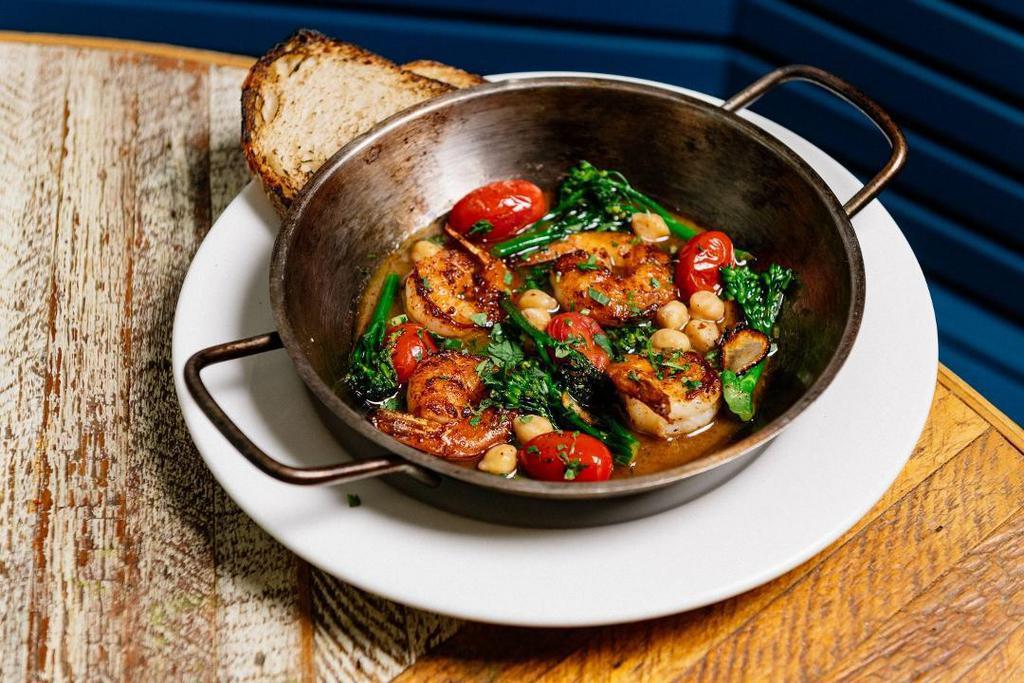Ouzo Shrimp · Shrimp cooked with ouzo, sumac, chickpeas, broccolini and served with grilled country bread