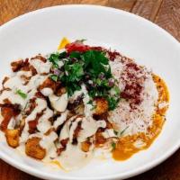 Shawarma Plate · Pan seared chicken shawarma over basmati rice with parsley-onion salad, roasted red pepper, ...