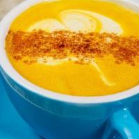 Turmeric Latte · Turmeric steamed with almond milk and topped with cinnamon.
