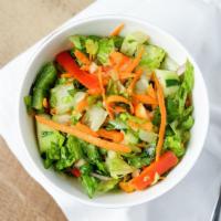 House Salad · Carrots, cucumbers, peppers, red onion and tomato.