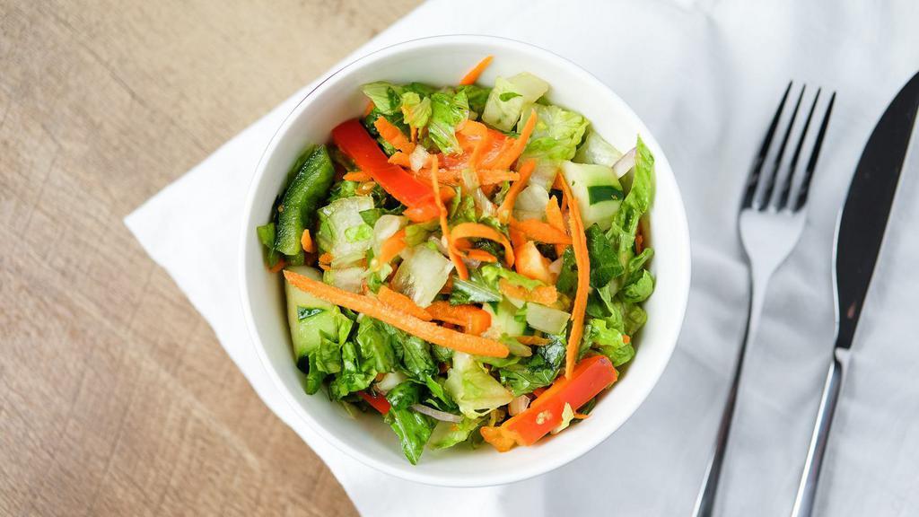 House Salad · Carrots, cucumbers, peppers, red onion and tomato.