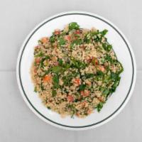 Tabouli Salad · Vegan, gluten free. Quinoa, tomatoes, parsley and mint.