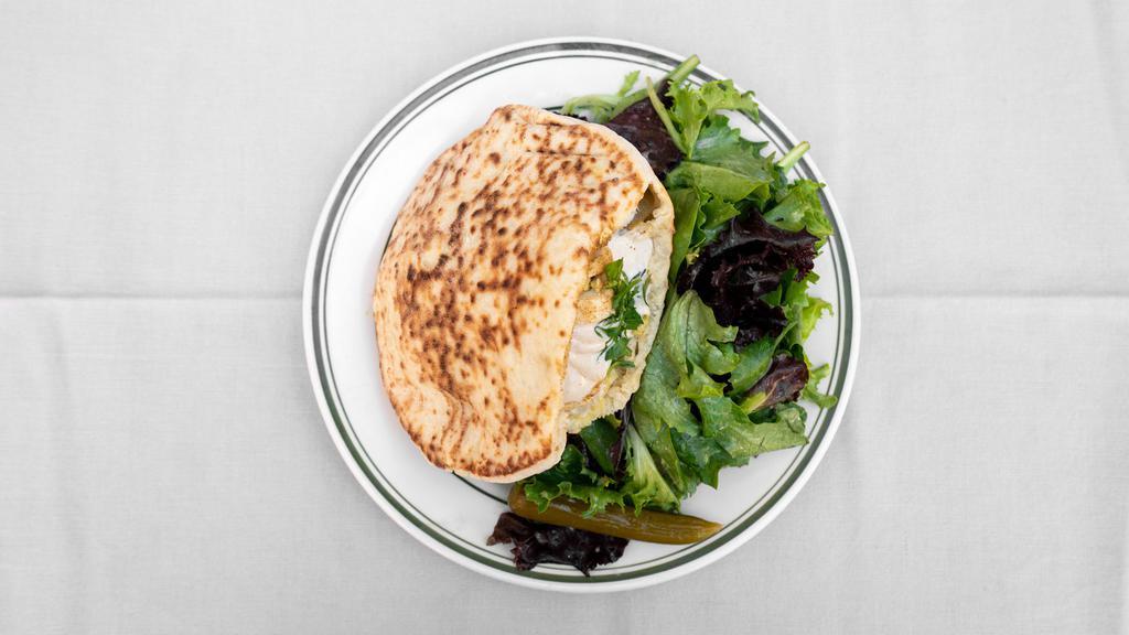 Eggplant Sandwich · Hummus, eggplant, hard boiled egg, pickles and tahini and Mix Greens.