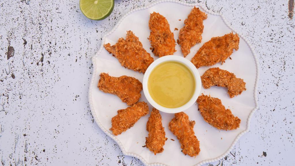 Honey Mustard Chicken Tenders (10 Pieces) · Delicious Chicken Tenders tossed in Honey Mustard sauce. Served with customer's preference of dipping sauce.