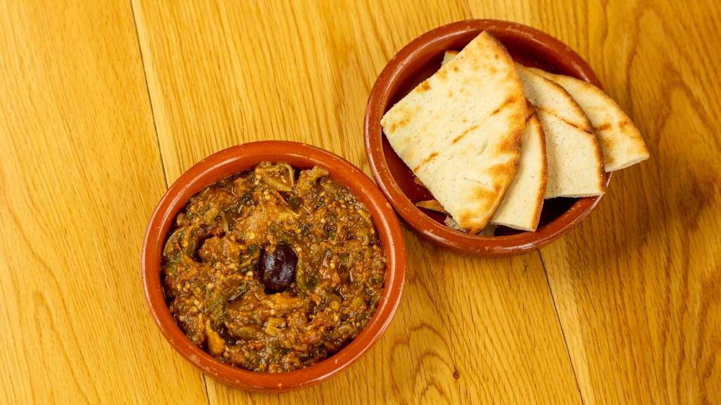Zaalouk (V) · Spread of roasted eggplants and roasted tomatoes, herbs and spices, served with pita bread