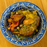 Chicken Tagine
 · Slow cooked chicken in a blend of herbs & spices with, vegetables, preserved
lemon and olive...
