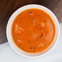 Chicken Tikka Masala · Tender boneless pieces of chicken broiled in the tandoor then cooked in a rich tomato, onion...