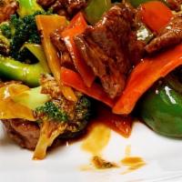 Beef With Mixed Vegetables · Served with white rice.