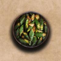 Original Okra Masala · Fresh okra slices sautéed with onions, tomatoes, and herbs. Served with a portion of aromati...