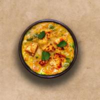 Tangy Cottage Cheese Tikka Masala · Oven cooked pieces of cottage cheese in a rich creamy tomato and onion based gravy. Served w...