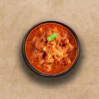 Spice Lane Lamb Curry  · Tender lamb morsels cooked to perfection with traditional Indian herbs. Served with a portio...