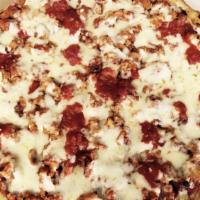 Chicken Parm Pan Pizza · Deep-dish pan pizza with fried chicken, special sauce and mozzarella cheese.