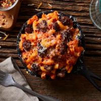 Mac And Cheese With Sausage And Vodka Sauce · Elbow noodles with a rich vodka mac and cheese sauce and crumbled sausage.