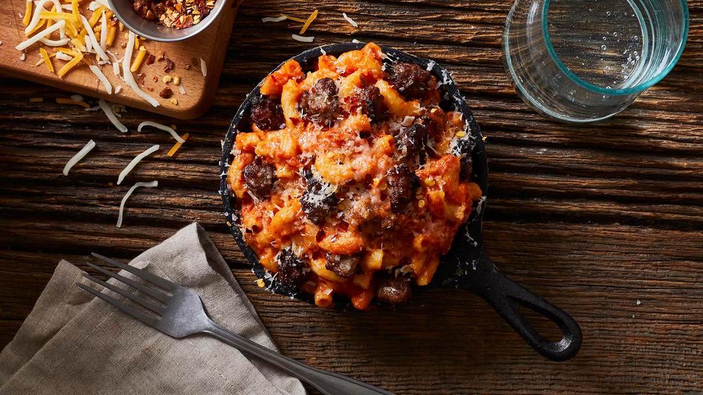 Mac And Cheese With Sausage And Vodka Sauce · Elbow noodles with a rich vodka mac and cheese sauce and crumbled sausage.
