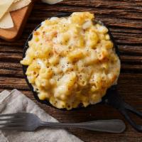 Truffle Mac And Cheese · Elbow noodles with a rich mac and cheese sauce and truffle oil.