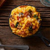 Mac And Cheese With Spinach And Portobello Mushrooms · Elbow noodles with a rich mac and cheese sauce, spinach, and portobello mushrooms.