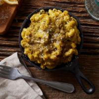 Mac And Cheese With Pesto · Elbow noodles with a rich pesto mac and cheese sauce.