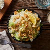 Caesar Salad · Hearts of romaine with a classic caesar dressing.