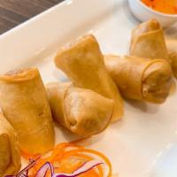 Spring Roll  · Cabbage, carrot, celery and glass noodle, served with sweet chili sauce.