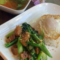 Chinese Broccoli Crispy Pork Rice · Served with fried egg. Medium spicy come with clear soup.
