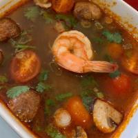 Tom Yum Soup · Spicy. Shrimp, chili, lemongrass, tomato, galangal, lime juice and mushroom.