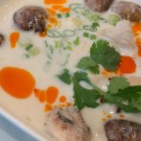 Tom Kha Soup · Coconut milk, galangal, lime juice, and mushroom.