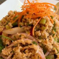 Larb Gai · Ground chicken, red onion scallion, rice powder with chili lime dressing.
