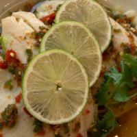 Tilapia Lime Sauce · Spicy. Steamed tilapia, lime juice, chili and garlic.